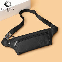 Black pebbled leather waist bag flat-lay showing full strap and brand logo, top-down view