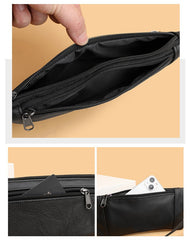 Black leather waist bag interior size reference with card and smartphone, close-up angled detail